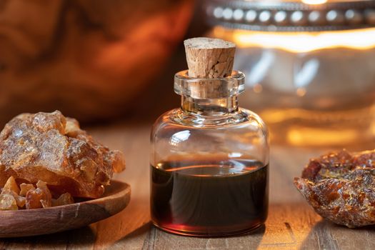 A bottle of myrrh essential oil and resin