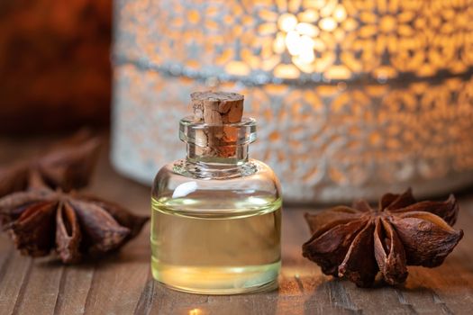 A bottle of essential oil with star anise