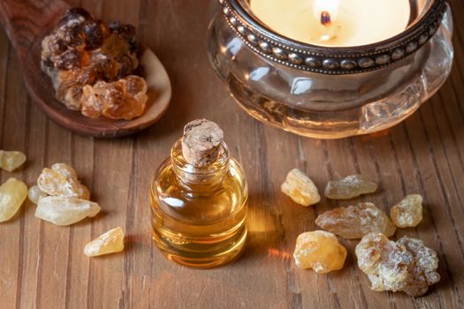 A bottle of essential oil with frankincense resin