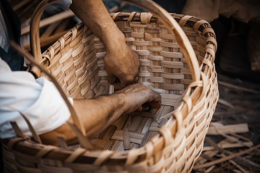 Making wicker baskets, detail of traditional craft