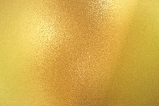 Texture of yellow brushed metallic plate, abstract background
