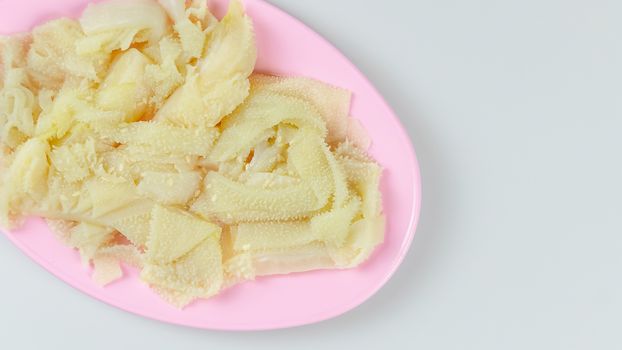 top view raw tripe on plate on white background