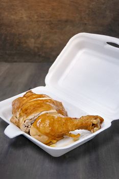 close up of Boiled chicken with soy sauce on foam box