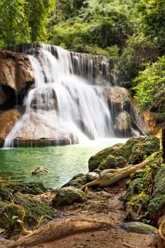Fresh waterfall in rainforest at National Park, Thailand.