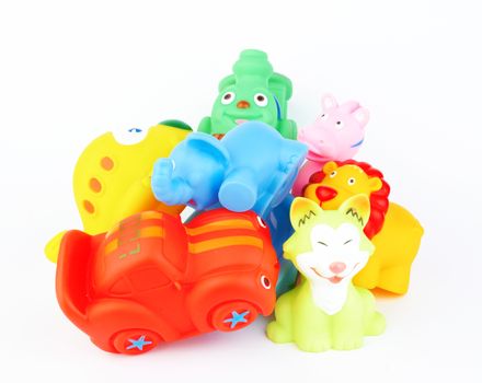 plastic bath toys on white 