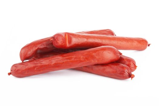 Raw red sausage on a white background