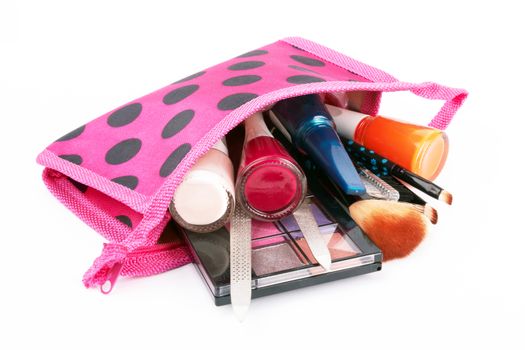 Make up bag with cosmetics and brushes isolated on white