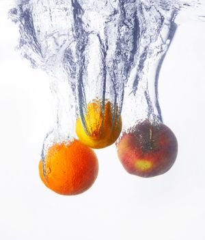 Fresh fruits in water splash 