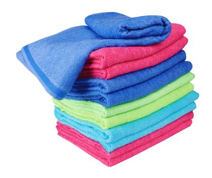 stacked colorful towels on a white background 