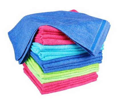 stacked colorful towels on a white background 