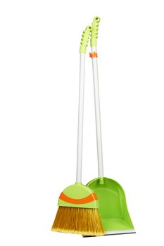 Green scoop with a broom on a white background 