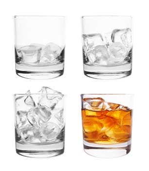 Glass of scotch whiskey and ice on a white background