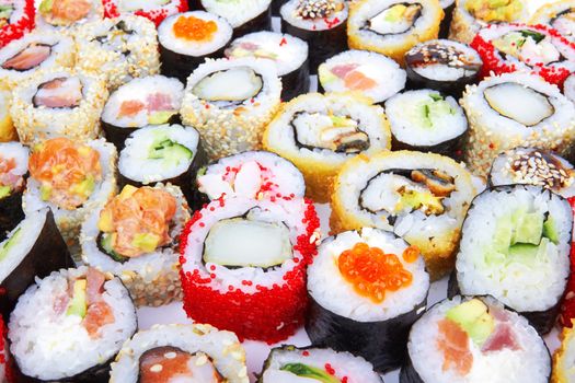 different types of sushi as background