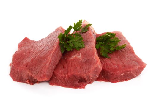 Three round steaks on a white background 