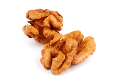 Group of peeled walnuts isolated on a white 