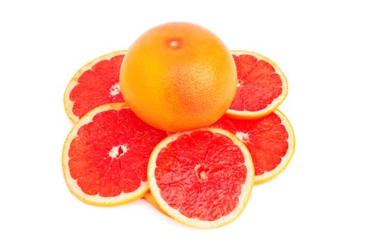 Grapefruit with slices on a white background