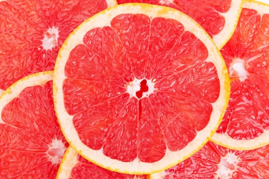 fresh grapefruit and slices background