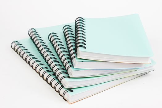 stack of ring binder book or notebook on white background