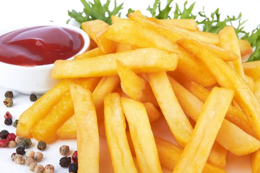 French fries with ketchup on a white background