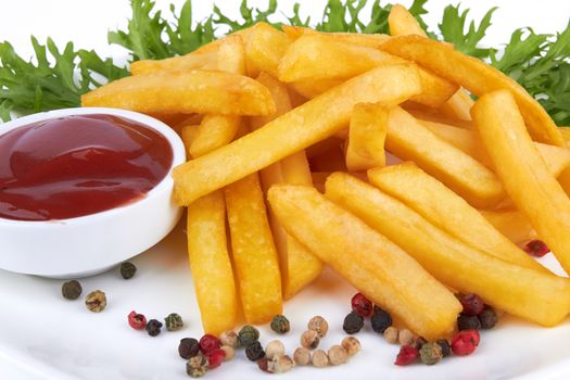 French fries with ketchup closeup over white 