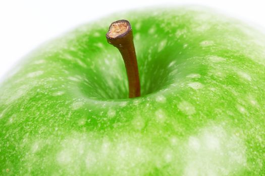 Green apple closeup on a white background 