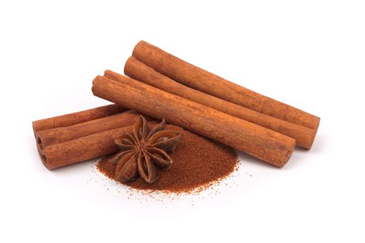 Cinnamon sticks and powder on white background