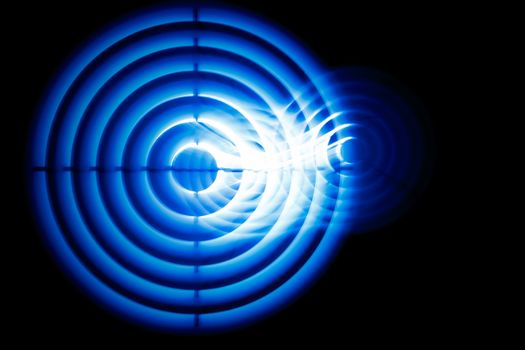 Sound waves in the visible blue color in the dark