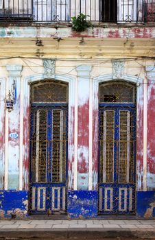 Tricycle and old building from Havana, Cuba