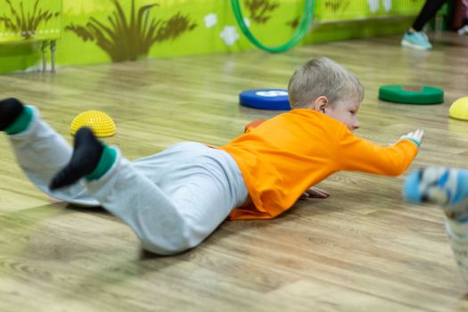 Russia, Khabarovsk - Feb 10, 2019: children's sports relay. Pajama party.