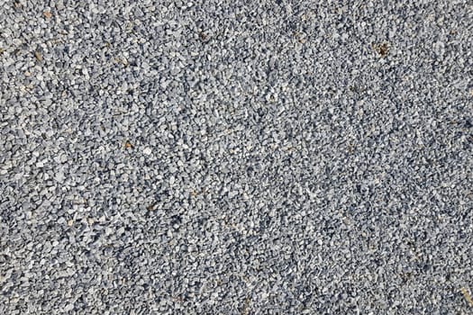 Close-up of a picture with gravel stones, pebbles as a background