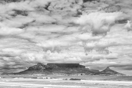 The Cape Town Central Business District and Table Mountain as seen across Table Bay from Bloubergstrand. Monochrome