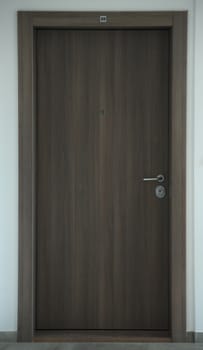 Entrance door to a condo, inside of a building