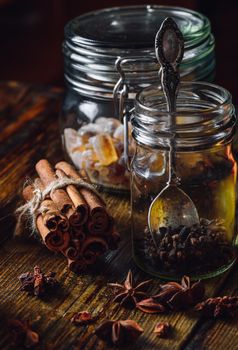 Christmas Spices on Wooden Table. Vertical Orientation.