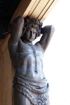 Closeup fragment of famous Atlas in St-Petersburg Hermitage museum, Russia