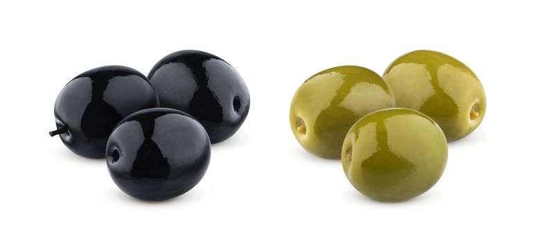 Three green and black olives isolated on white background with clipping path, close-up