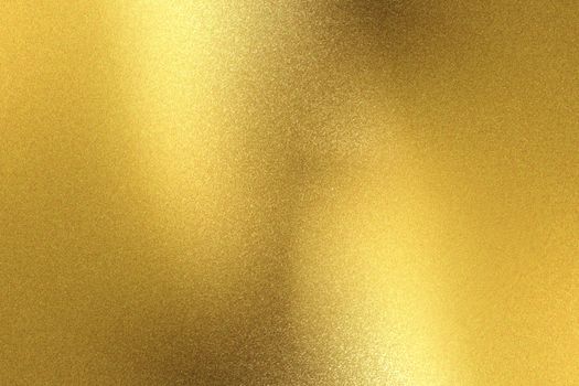 Glowing gold metallic wall surface, abstract background