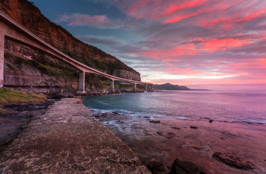 Sea Cliff Bridge is built out from the cliffs and spans a section of the Illawarra coastline after the cliff side road was deemed unsafe due to too many rock falls