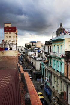 Street San Martin in Havana with former Presidential Palace dome in background