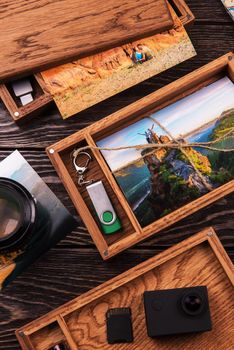 Wooden photo box with photo from travel. Decorated with different things. Travel concept.