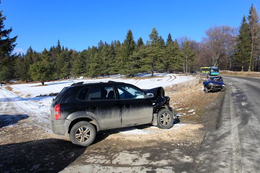 Two car damaged by crash accident on side of the road