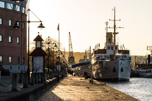 Romantic harbor port scene in Gothenburg at sunset