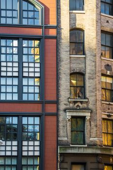 Old house facades New York red and brown brick windows