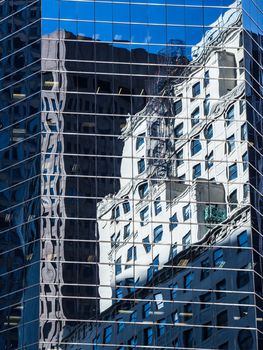 Reflection of Skyscraper on glass facade New York Manhattan Downtown