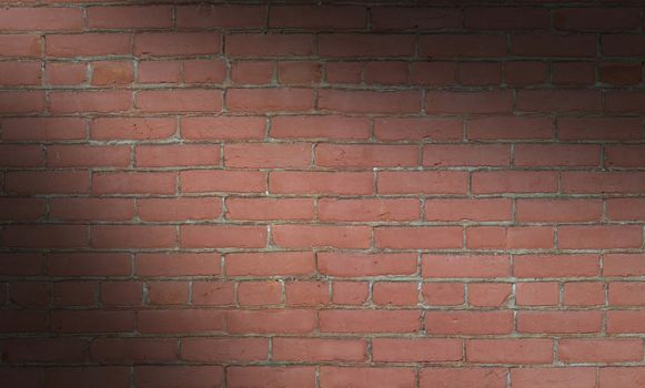 Red brick wall background texture  lit diagonally