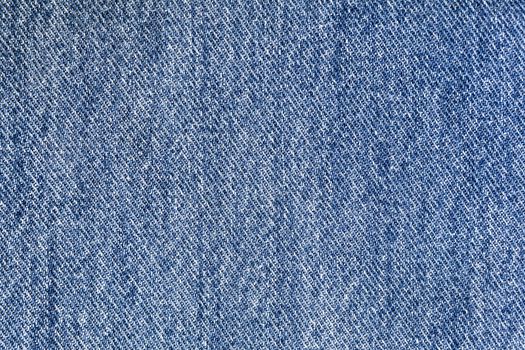 Blue denim fabric closeup