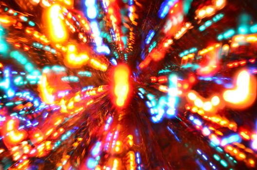 Multi-colored explosion of lights. Tunnel effect wallpaper