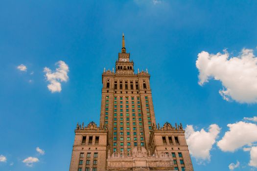 The Palace of Culture and Science of Warsaw from a low angle view. An historical public cultural institution and the tallest building in Poland.