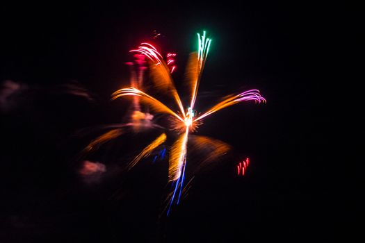 Firework fireworks celebration star form red green purple blue gold