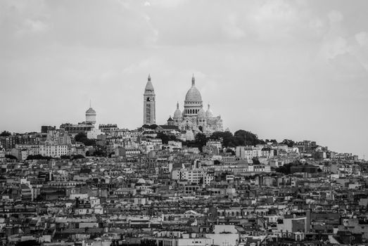 Town of Paris around Sacre Coeur on top of the hill black and white