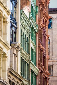 Brick and stone facades frontage in different colors